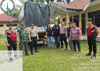 Pengawalan Sukses : Personel Polres Labuhanbatu Selatan Amankan Kotak Suara Menuju PPK Kecamatan Silangkitang