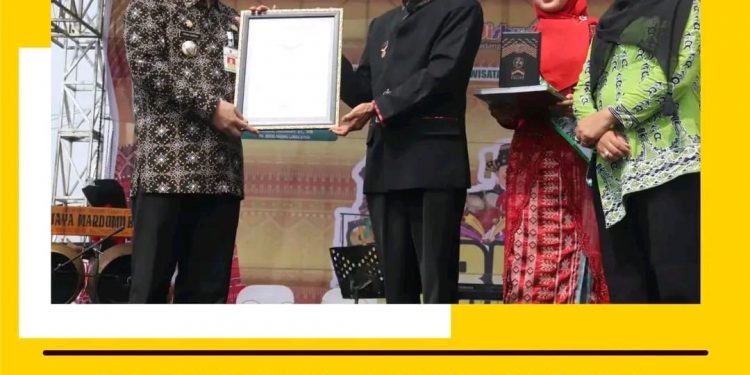 Pemkab Paluta Raih Rekor Muri Indonesia Dengan Penari Terbanyak Pada Tampilan Tor-Tor Nauli Naposo Bulung Melalui Gebyar Seni dan Budaya