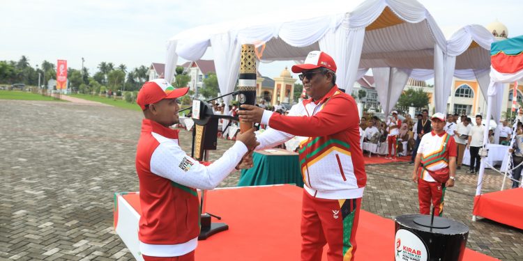 Pj Bupati Aceh Utara Pimpin Upacara Penyambutan Kirab Api PON XXI Aceh-Sumut Tahun 2024