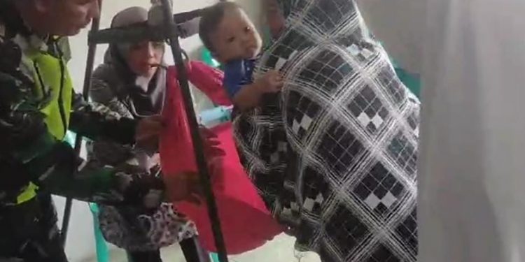 Babinsa Koramil 02/Karang Baru, Laksanakan Pendampingan Pelayanan Pos Yandu